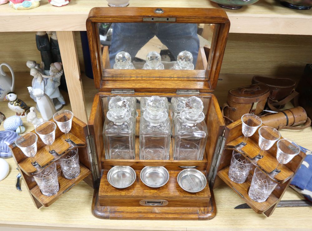 A Victorian oak-cased decanter / games box, height 33cm